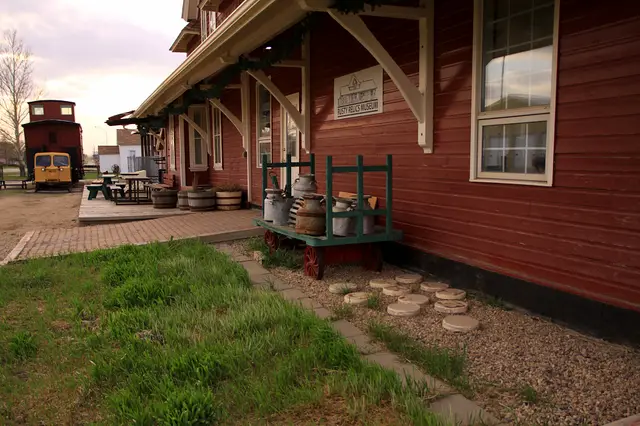 Rusty Relics Museum former train station with luggage cart and caboose