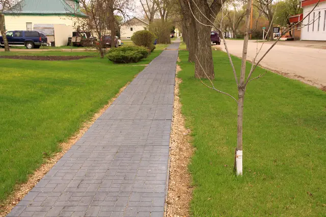Brick sidewalk along a residential street