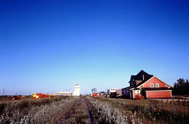 Railway tracks, station and grain elevator